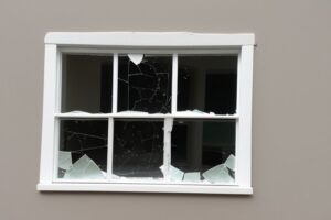 The shattered glass window pane investigated by Elementary Man