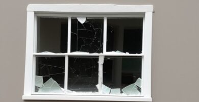 The shattered glass window pane investigated by Elementary Man, the hero of our short detective stories for children